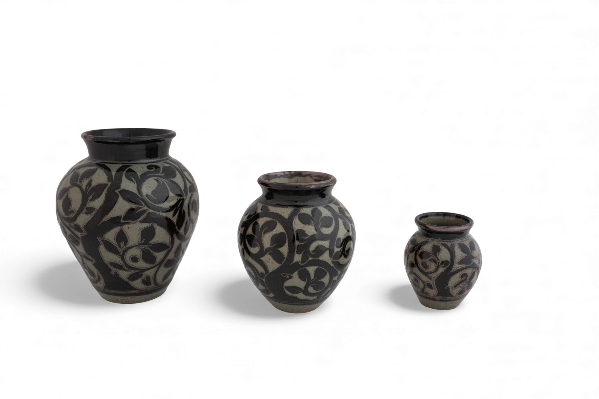 Vermont Handmade stoneware black carved nature vases