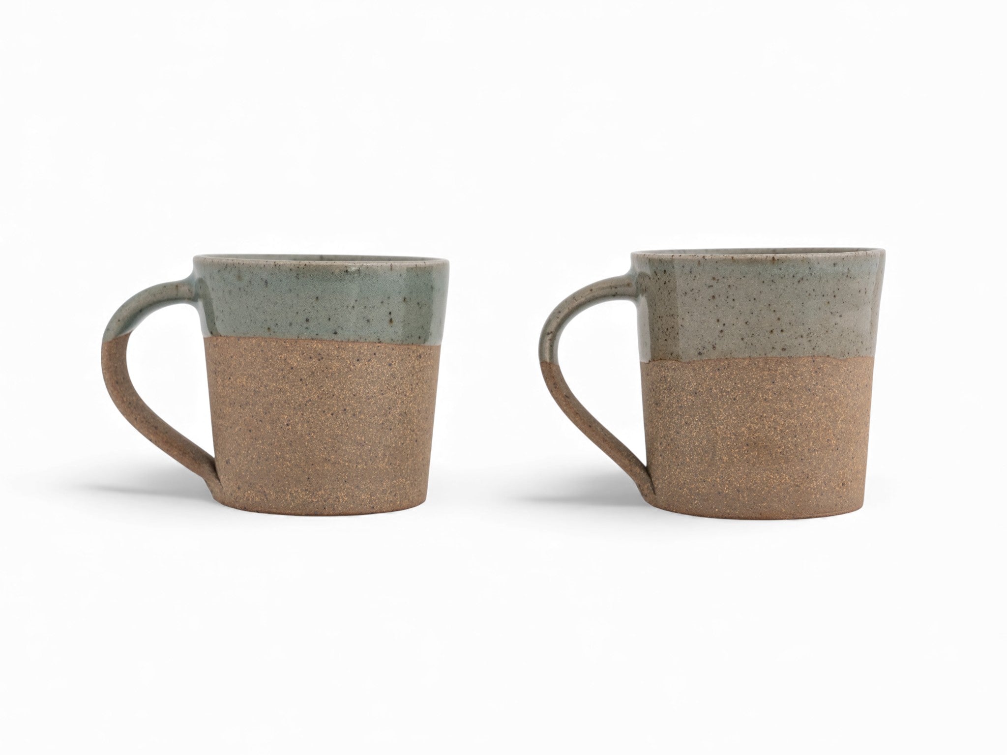 10 oz. handmade raw stoneware coffee mug dipped in celadon glaze