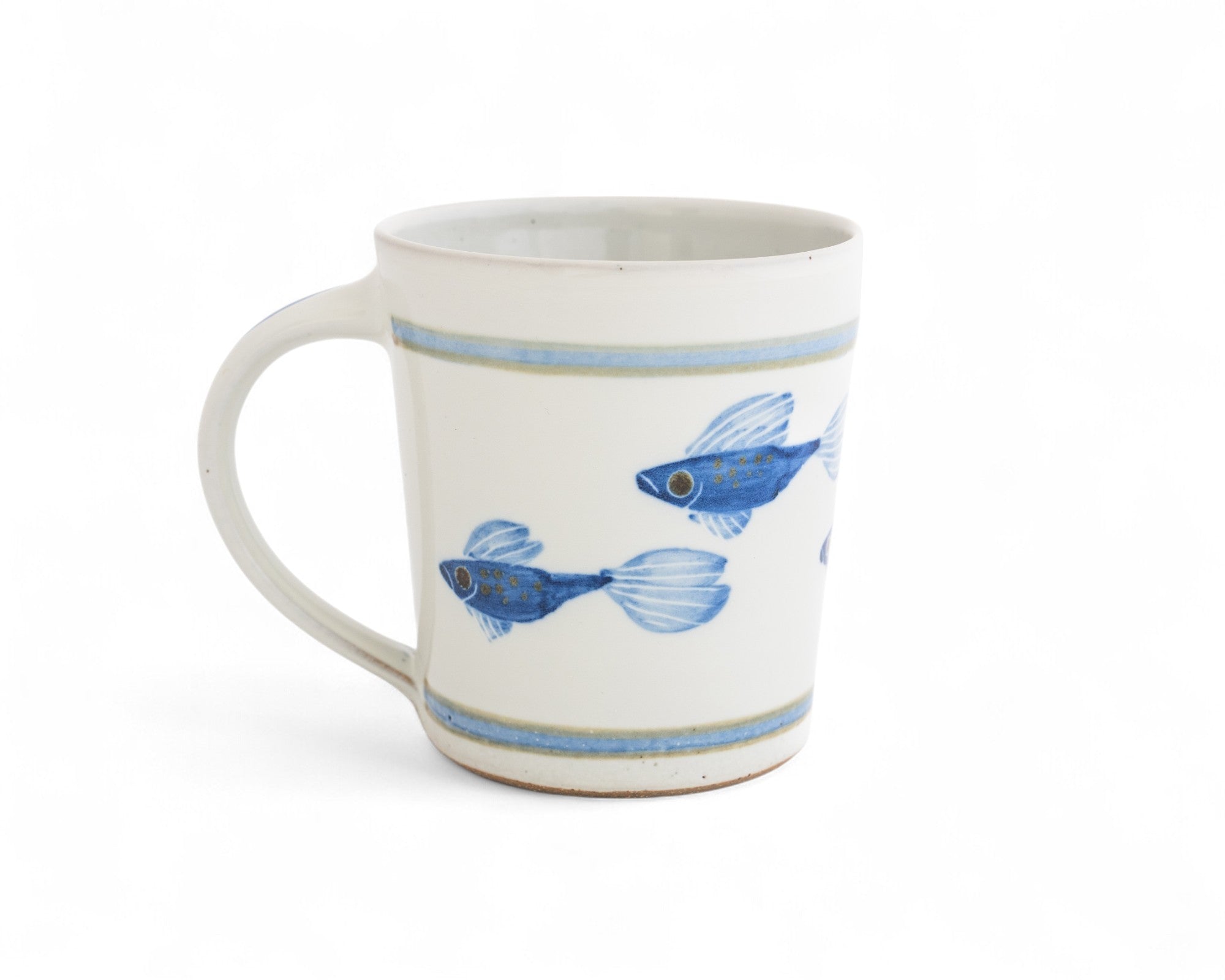 white handmade stoneware mug hand painted with cobalt blue fish