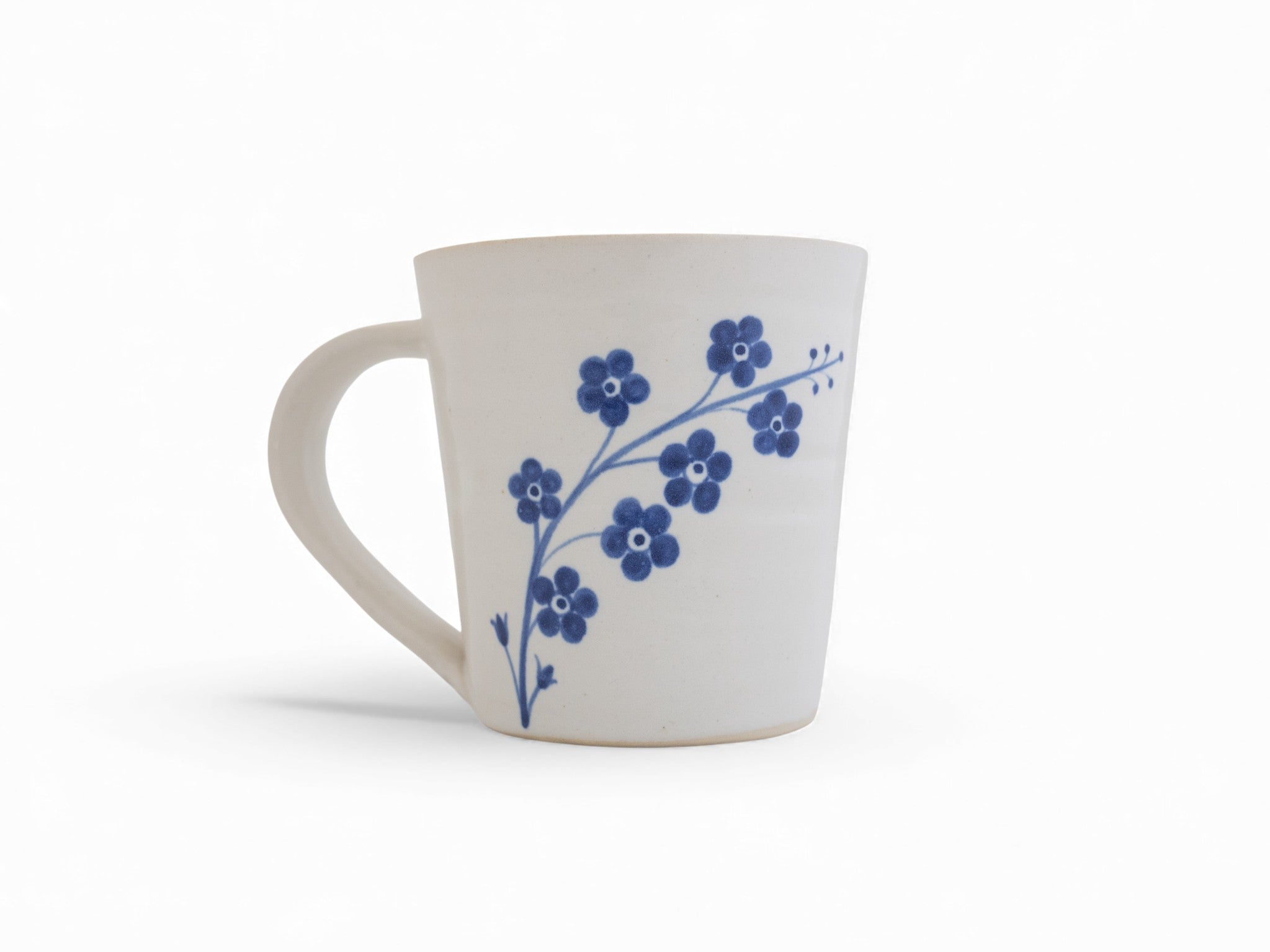 Stoneware hand thrown white + cobalt blue hand painted forget-me-not flowers