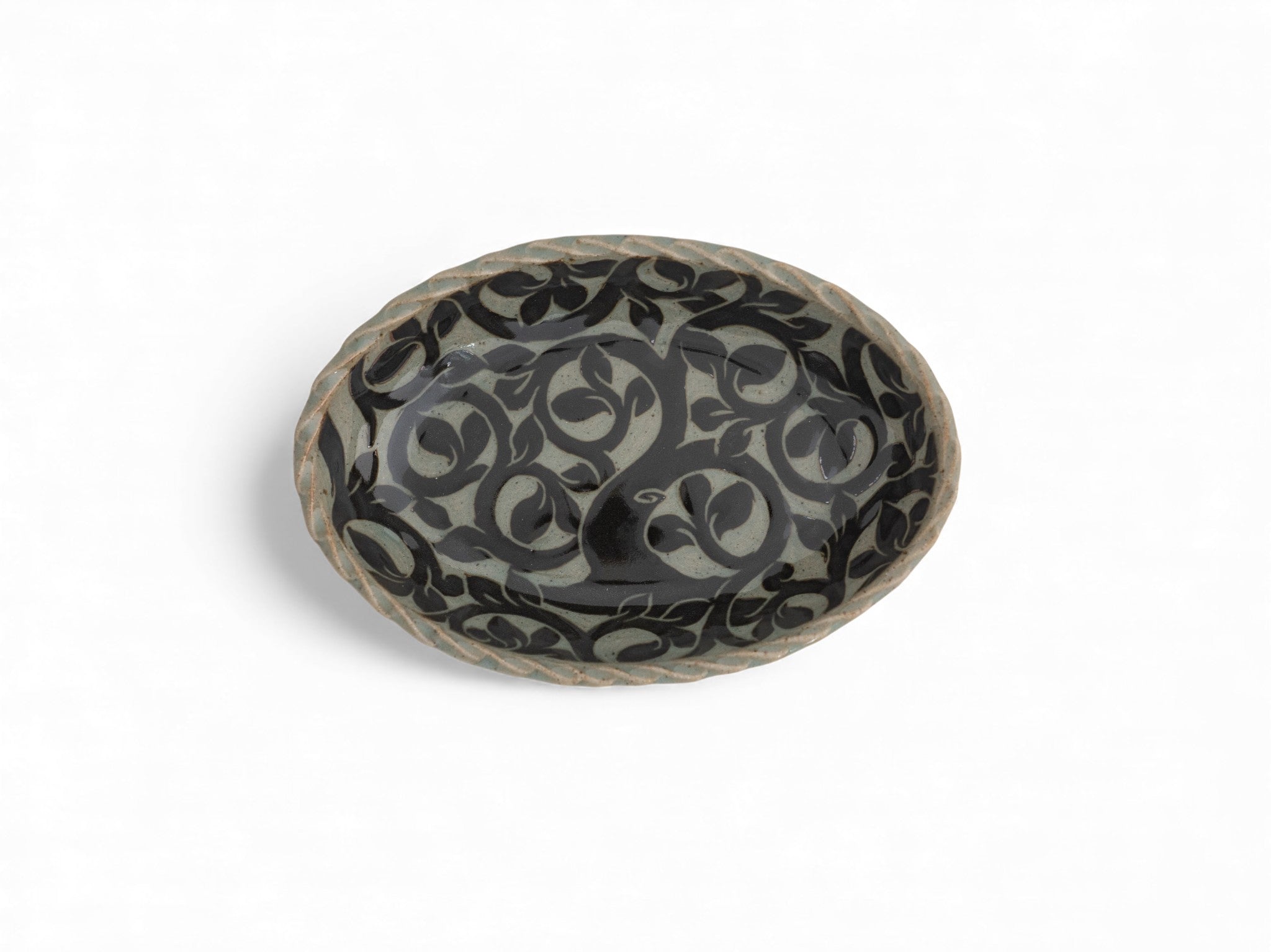 Handmade stoneware oval black carved platters with tree pattern