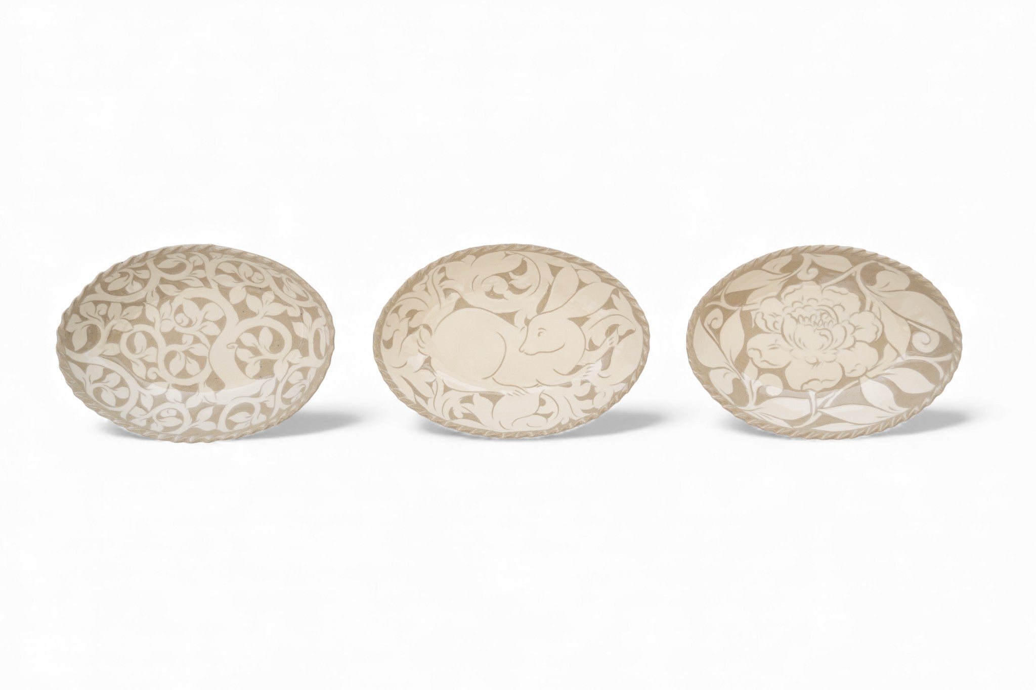 Handmade stoneware oval cream carved platters with tree pattern