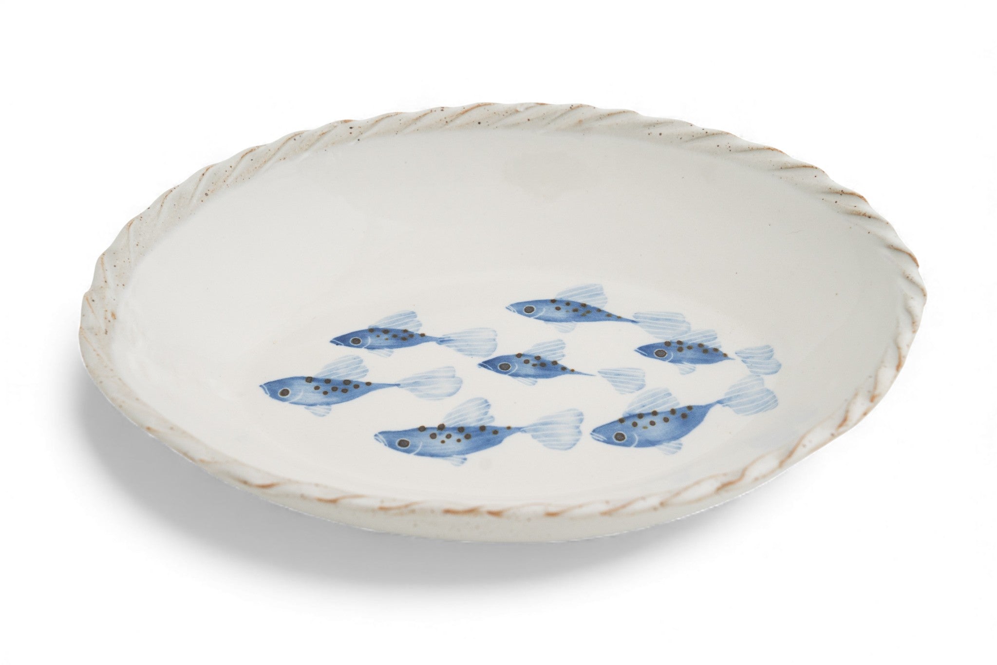 A handmade stoneware white oval platter with blue hand painted fish