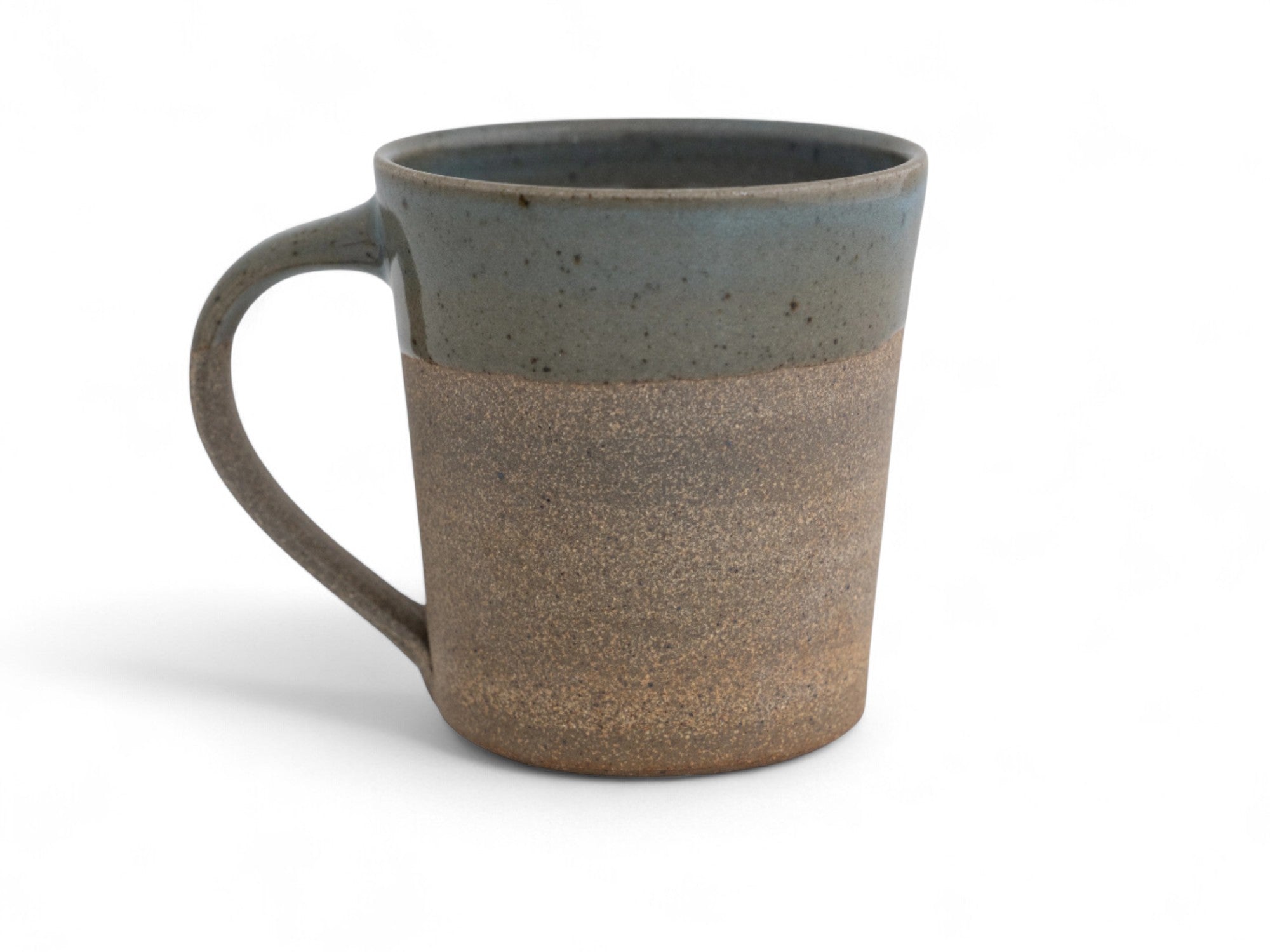 10 oz. handmade raw stoneware coffee mug dipped in celadon glaze