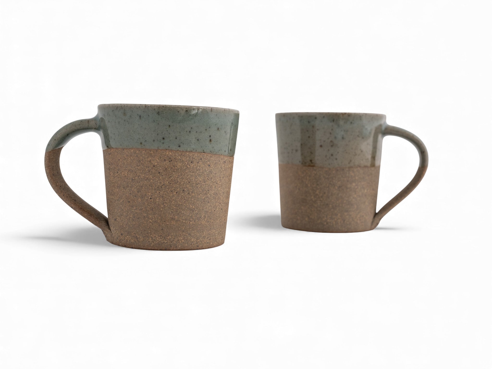 10 oz. handmade raw stoneware coffee mug dipped in celadon glaze