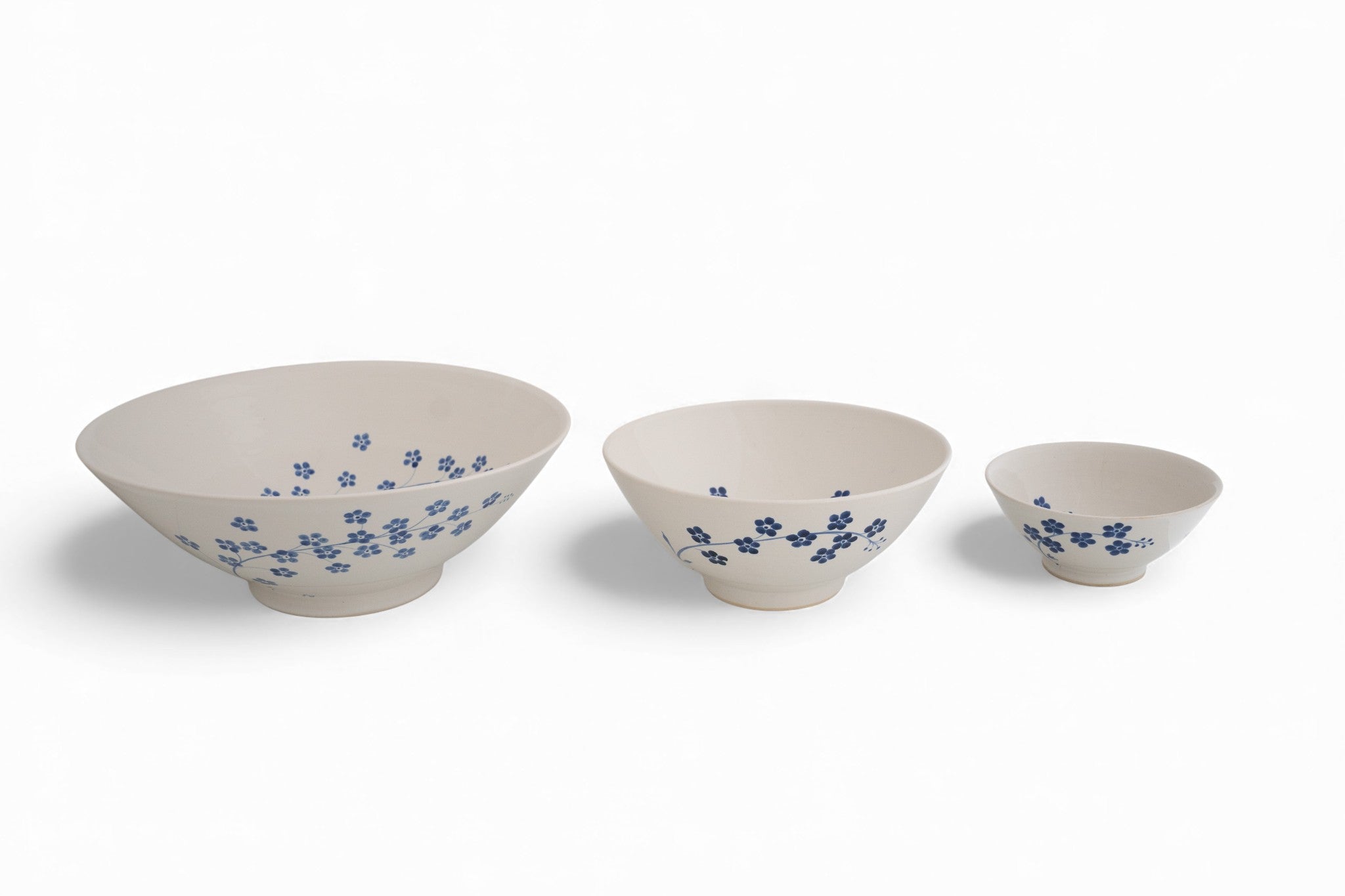 Handmade stoneware cereal bowl with hand painted forget-me-not flowers