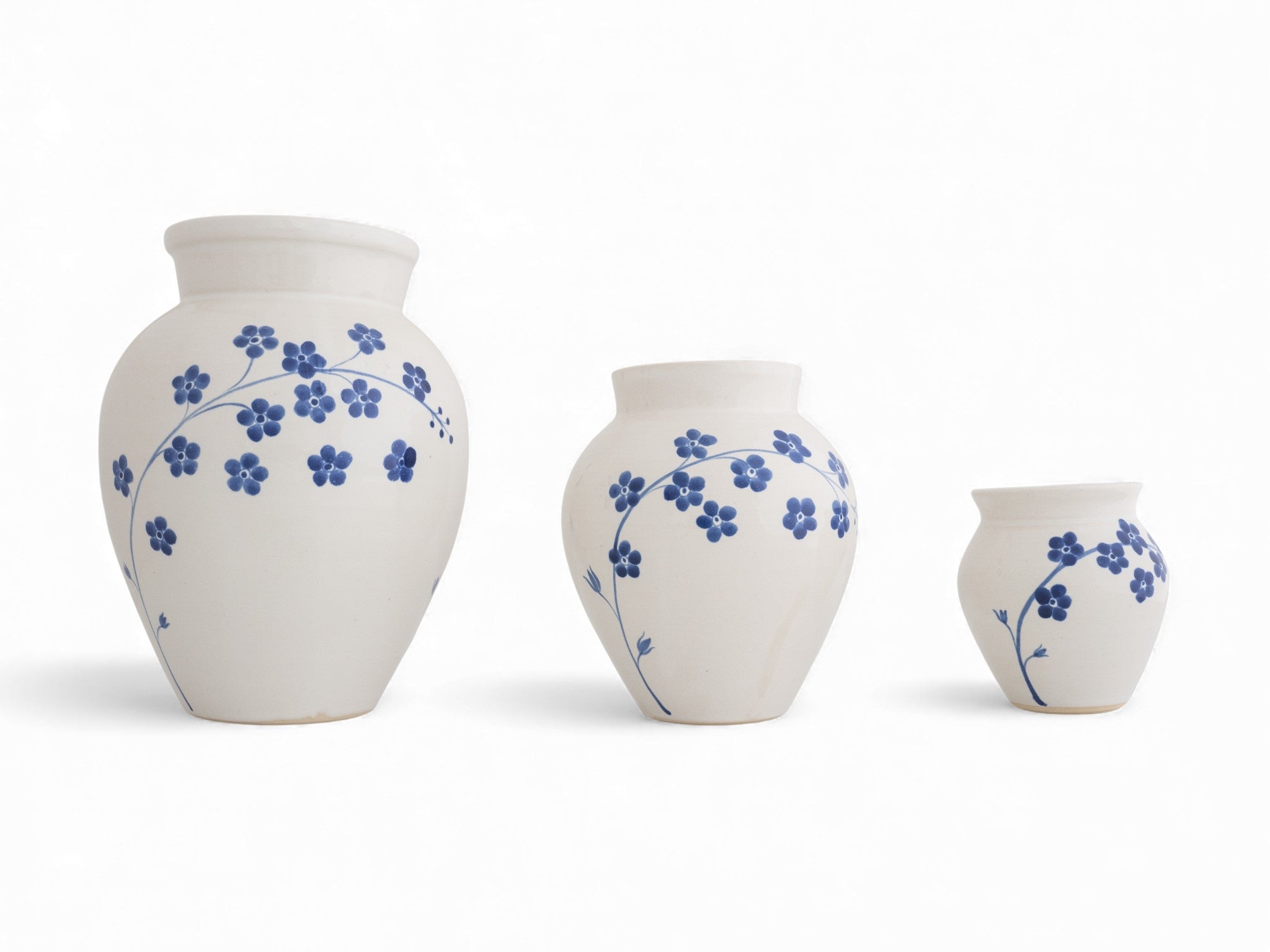 Handmade stoneware flower vase with hand painted forget-me-nots