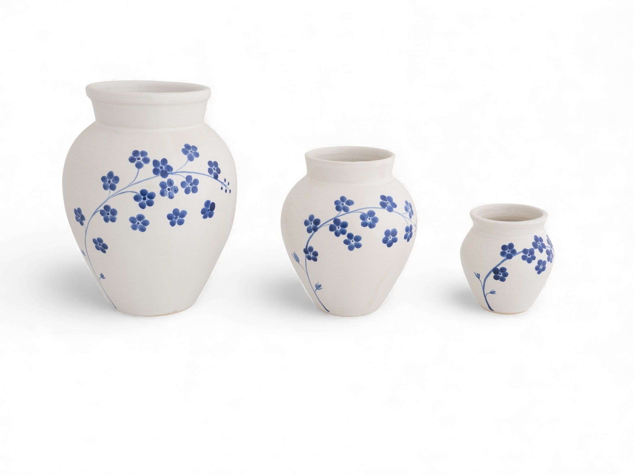 Handmade stoneware flower vase with hand painted forget-me-nots