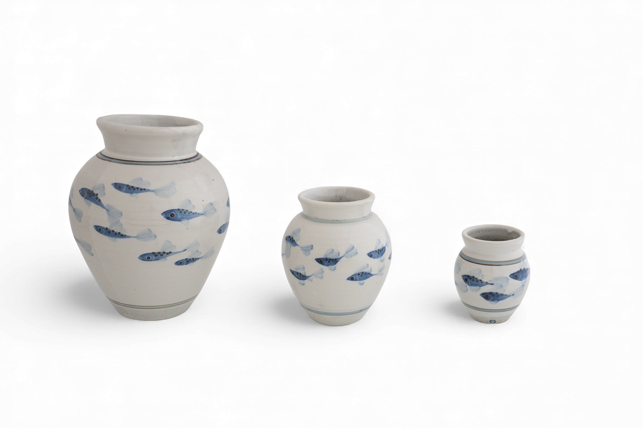 Handmade stoneware vase with painted fish