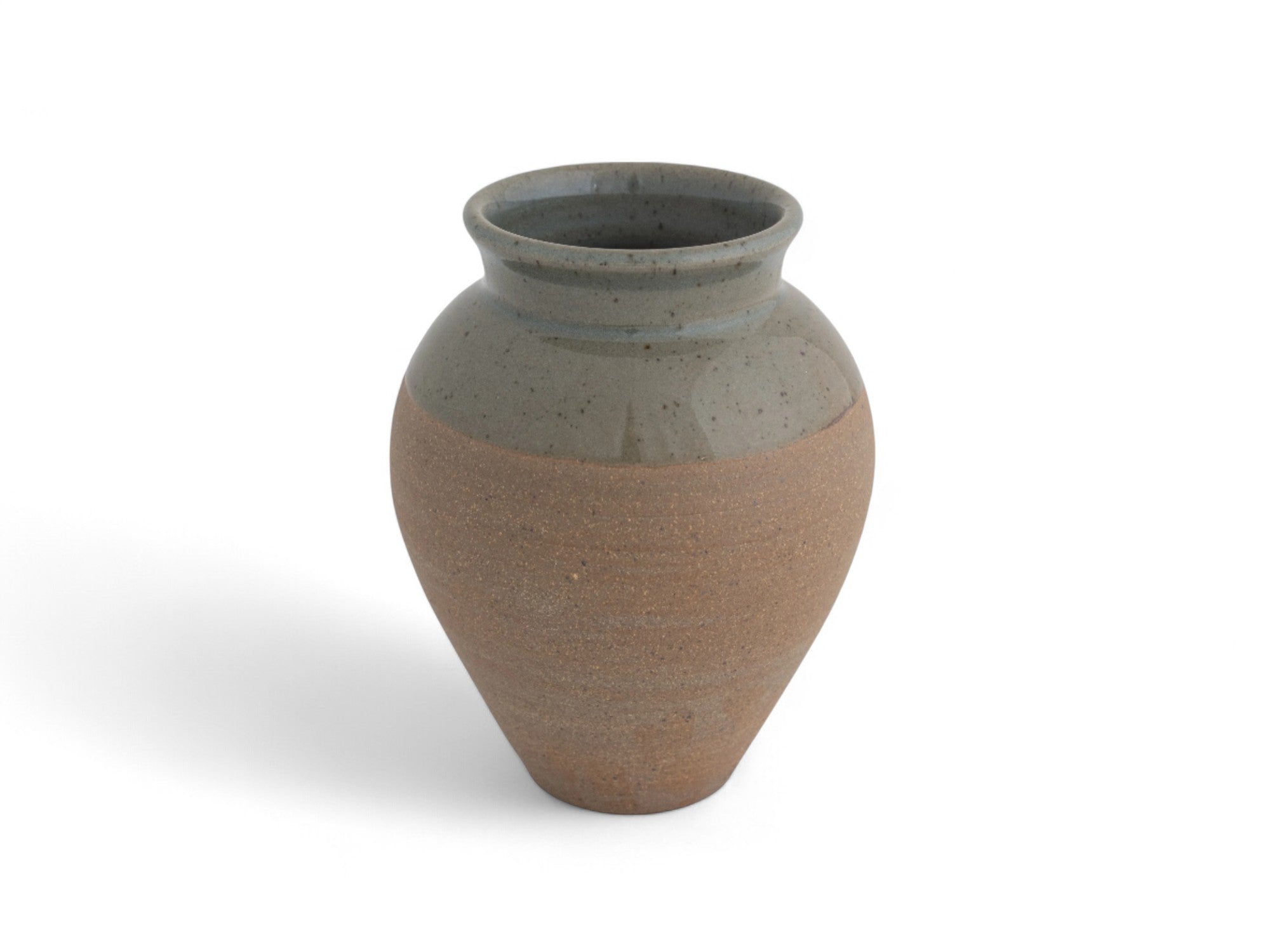 Hand made Raw Stoneware dipped in celadon glaze