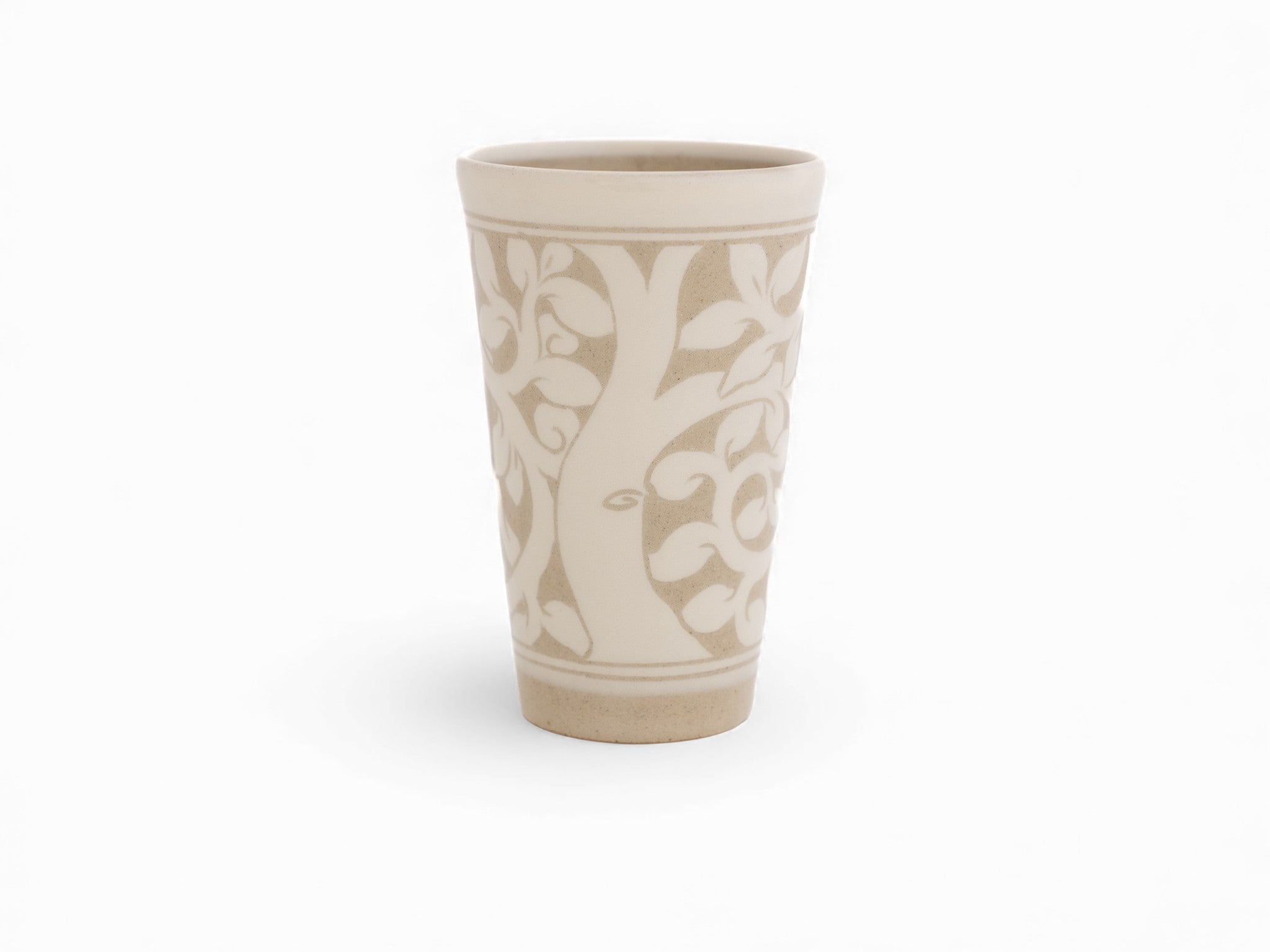 Handmade stoneware cream beaker cup tree pattern