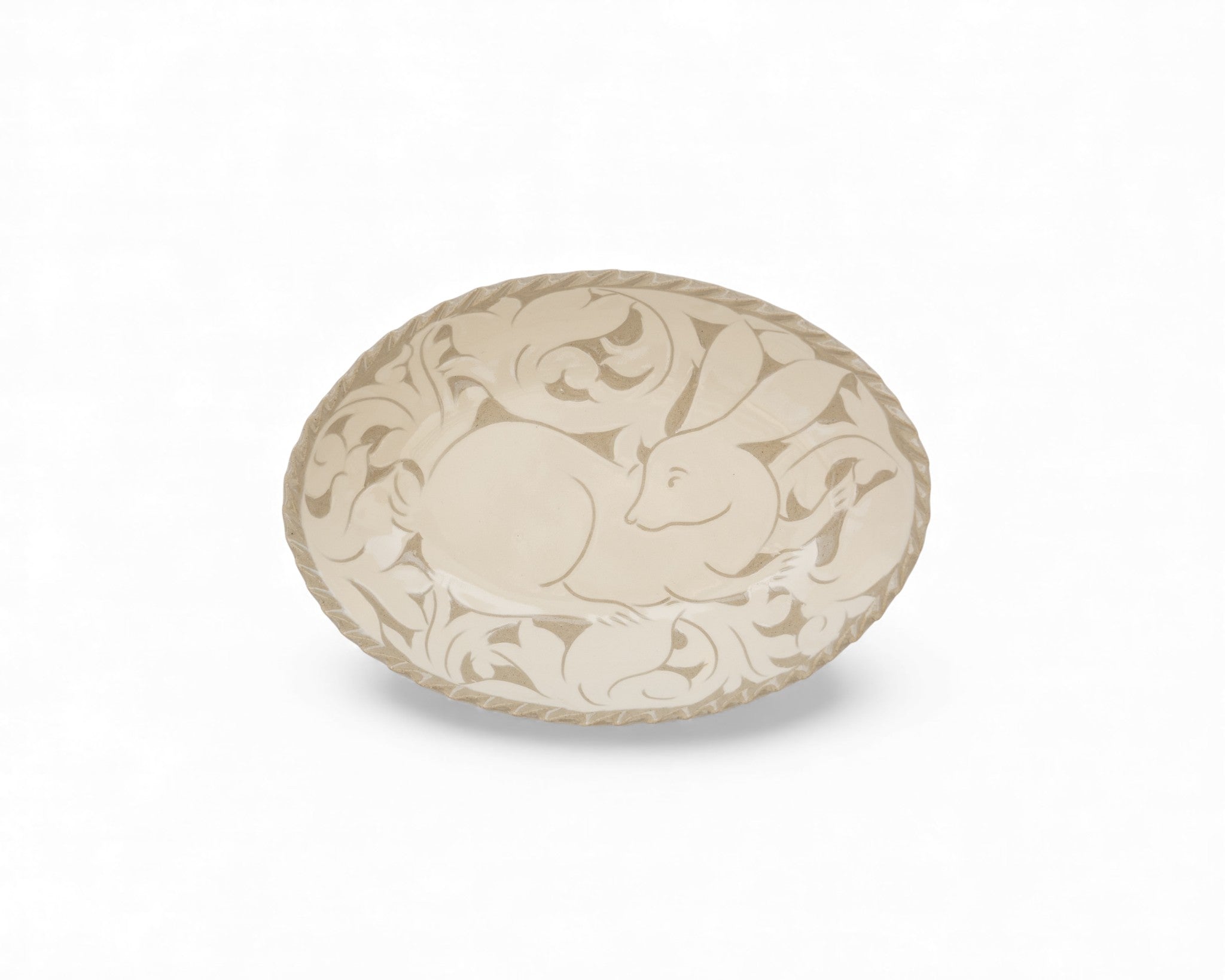 Handmade stoneware oval cream carved platters with rabbit pattern