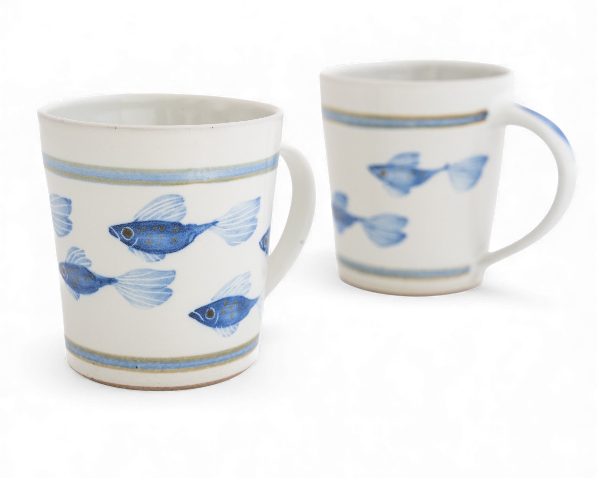 white handmade stoneware mug hand painted with cobalt blue fish