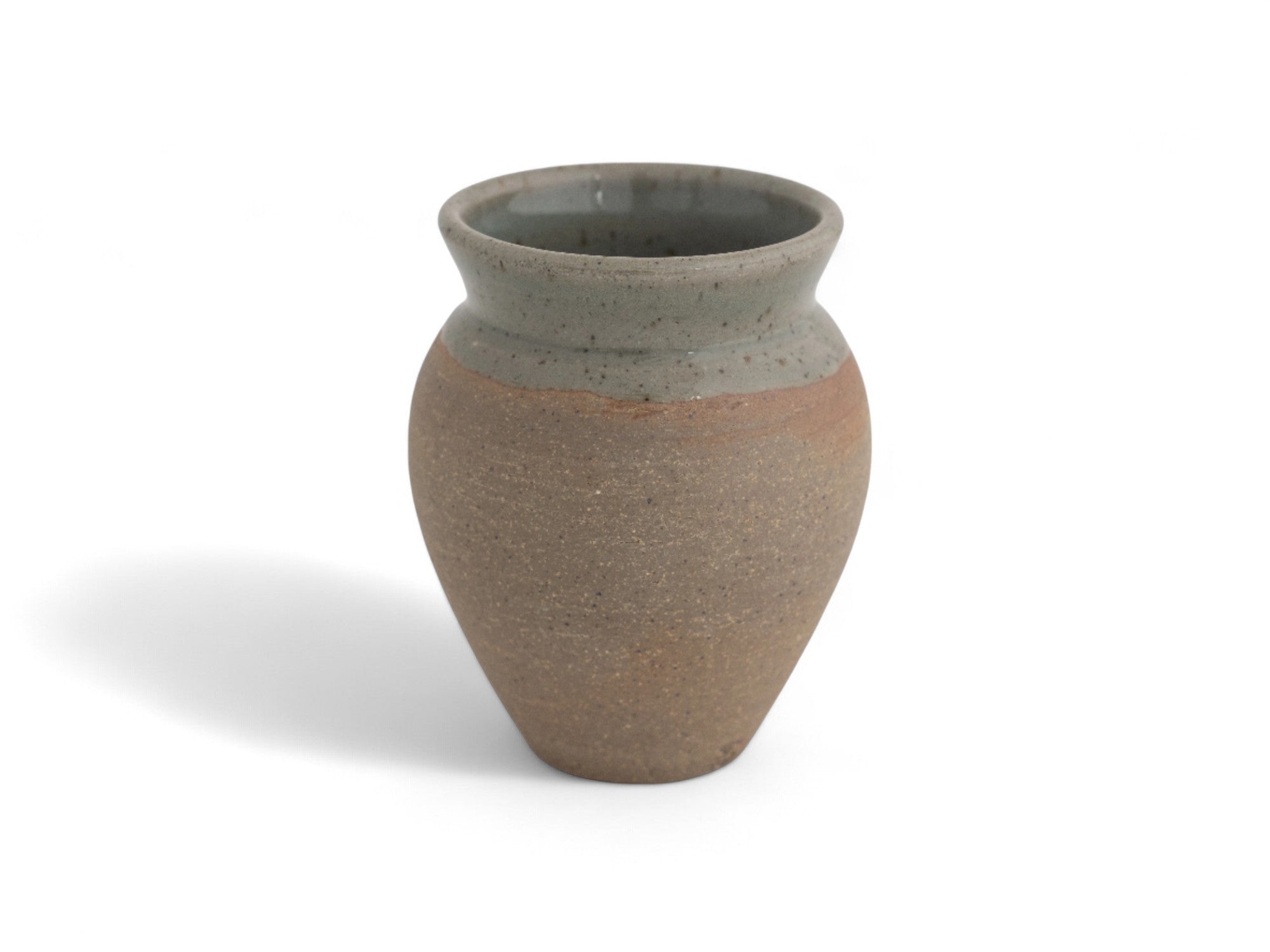 Hand made Raw Stoneware dipped in celadon glaze