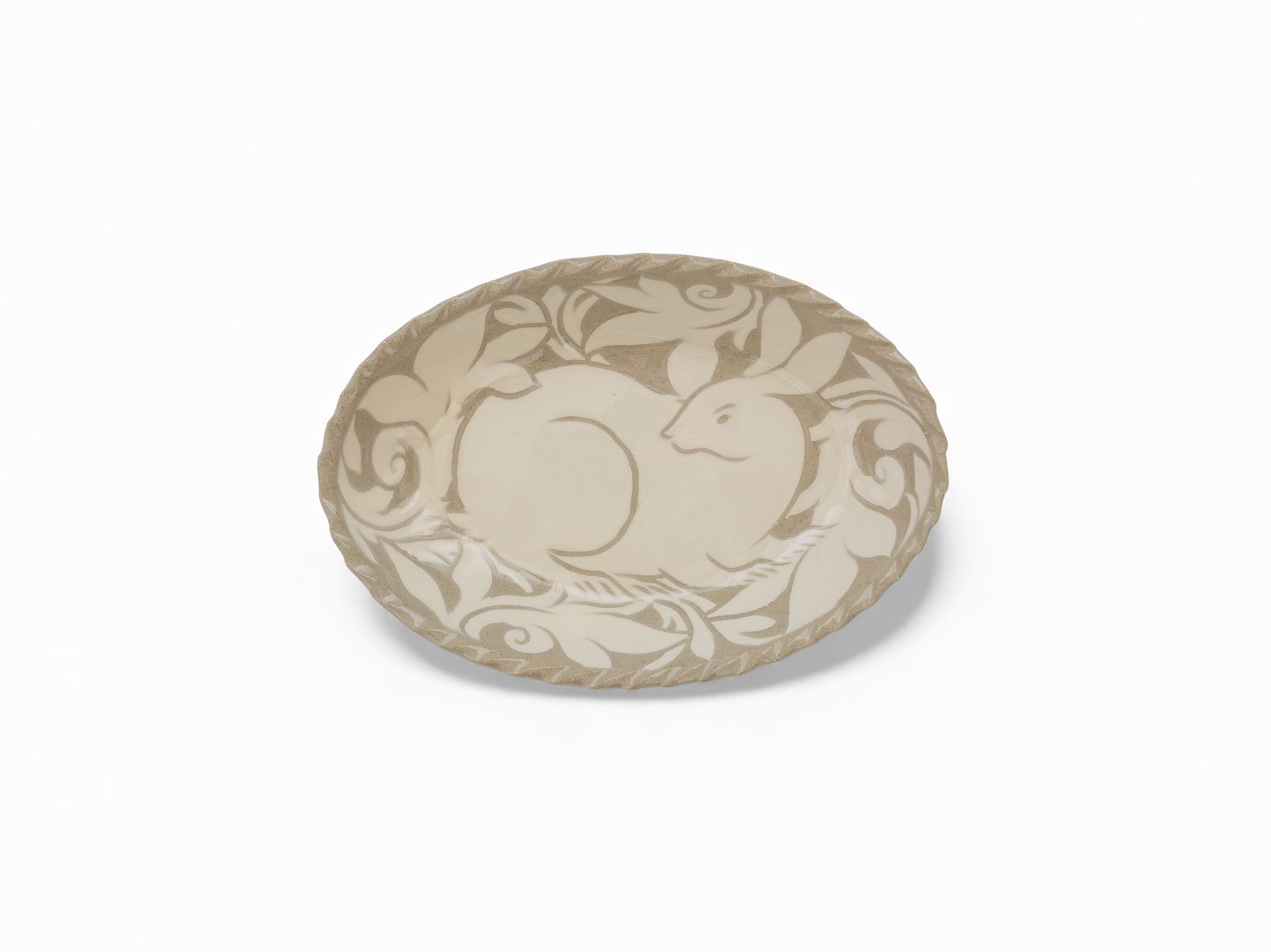Handmade stoneware oval cream carved platters with rabbit pattern